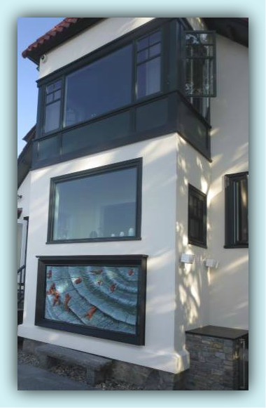 Mural installed on exterior wall, Casco Bay, South Portland, Maine