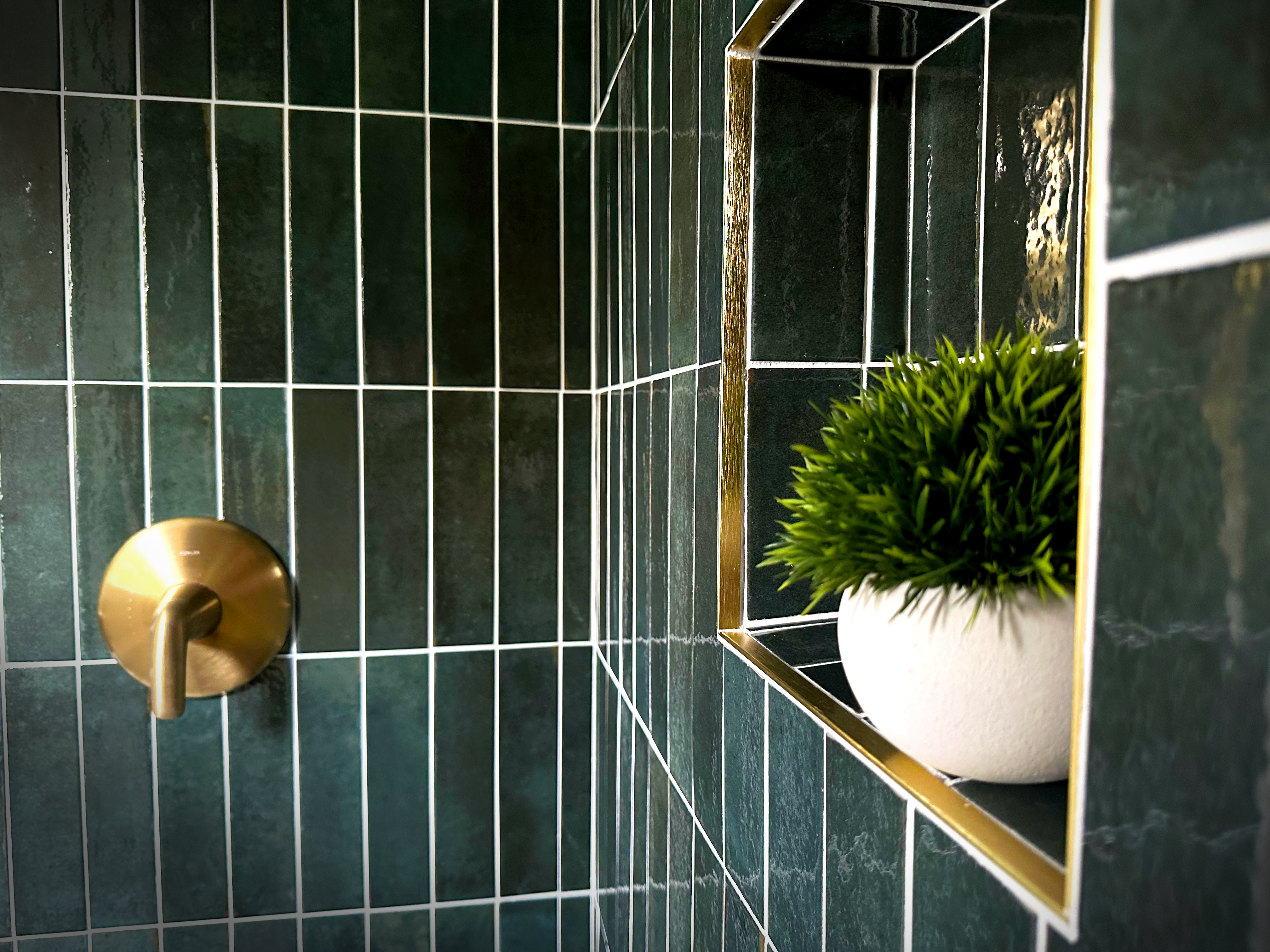 Green Tile Bathroom with Gold Profiles and Trims